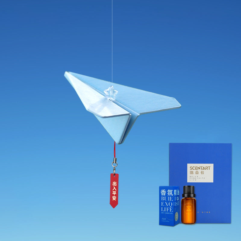 Aromatherapie hanger in de vorm van een papieren vliegtuigje
