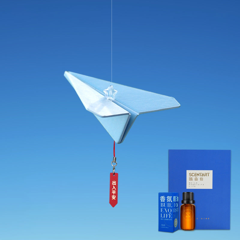 Aromatherapie hanger in de vorm van een papieren vliegtuigje