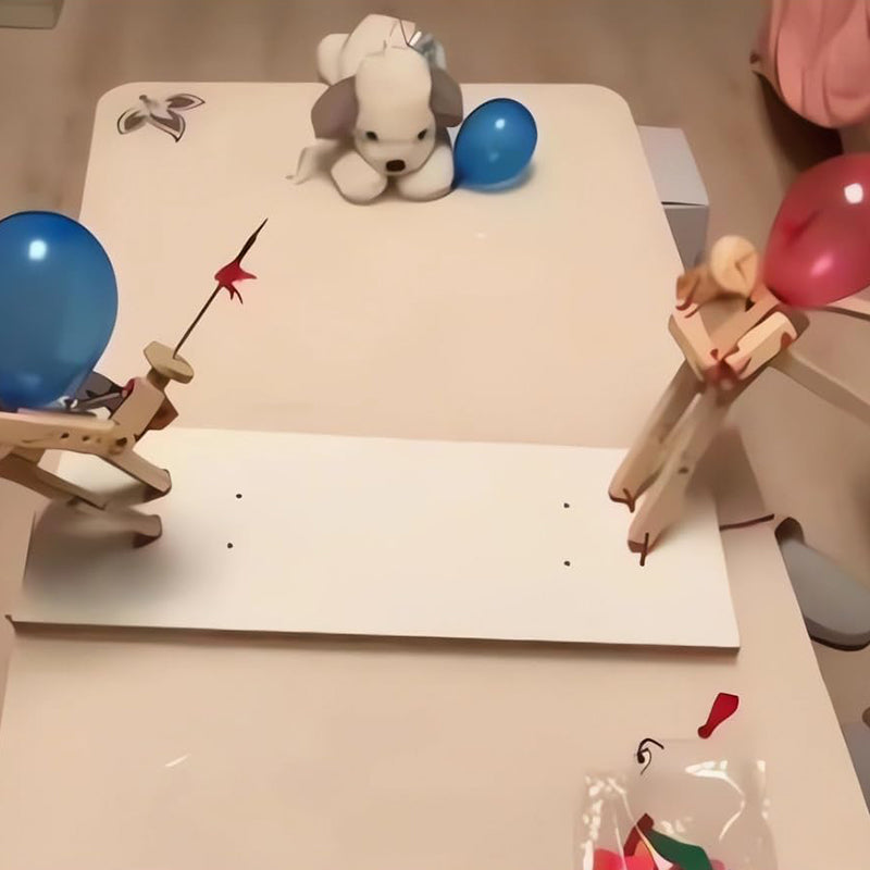 Houten hekwerkpoppen