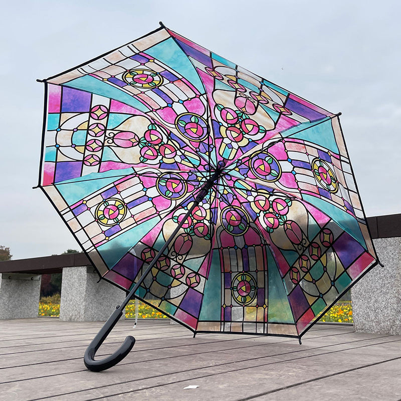 Transparante paraplu met glas-in-loodraampatroon