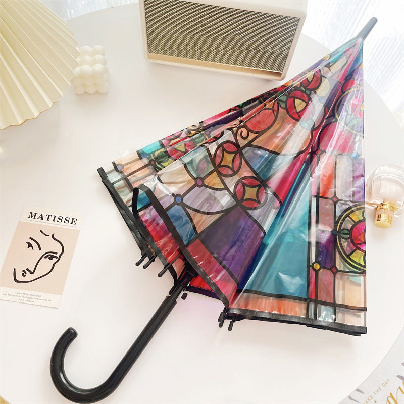 Transparante paraplu met glas-in-loodraampatroon