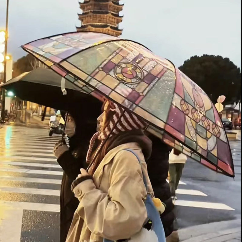 Transparante paraplu met glas-in-loodraampatroon