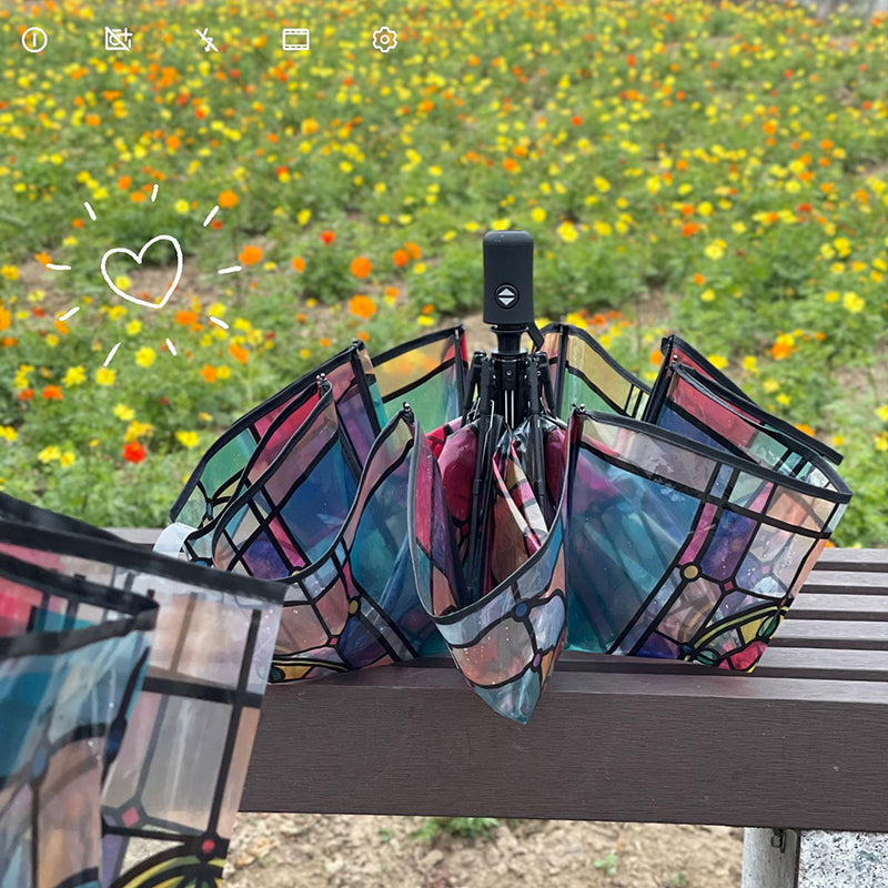 Transparante paraplu met glas-in-loodraampatroon