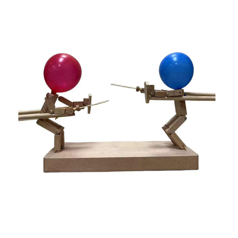 Houten hekwerkpoppen