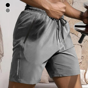 Herenshort met letterprint en trekkoord in de taille