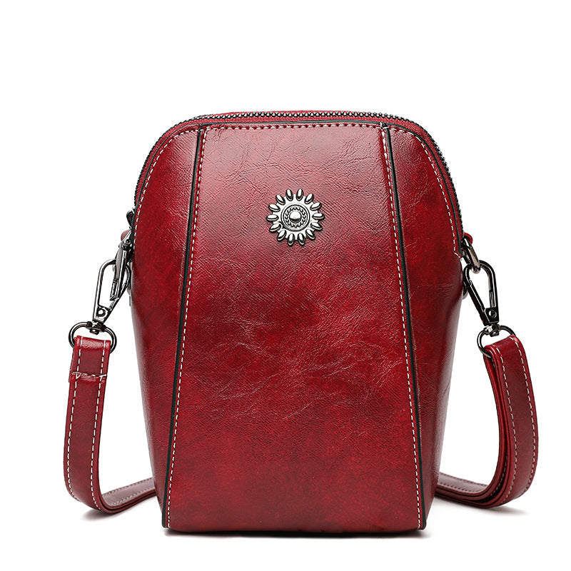 Mini-crossbodytas van zacht leer