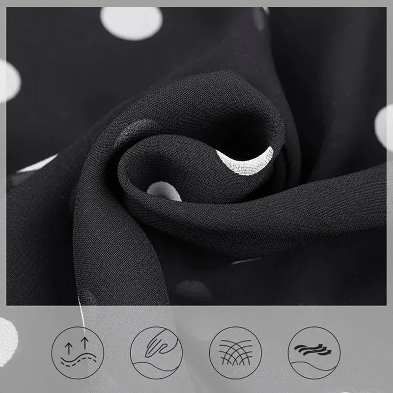 Zwarte culotte van chiffon met stippen