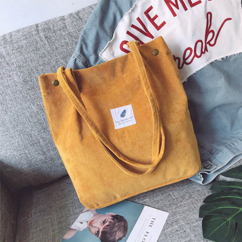 Corduroy draagtas met letterpatch