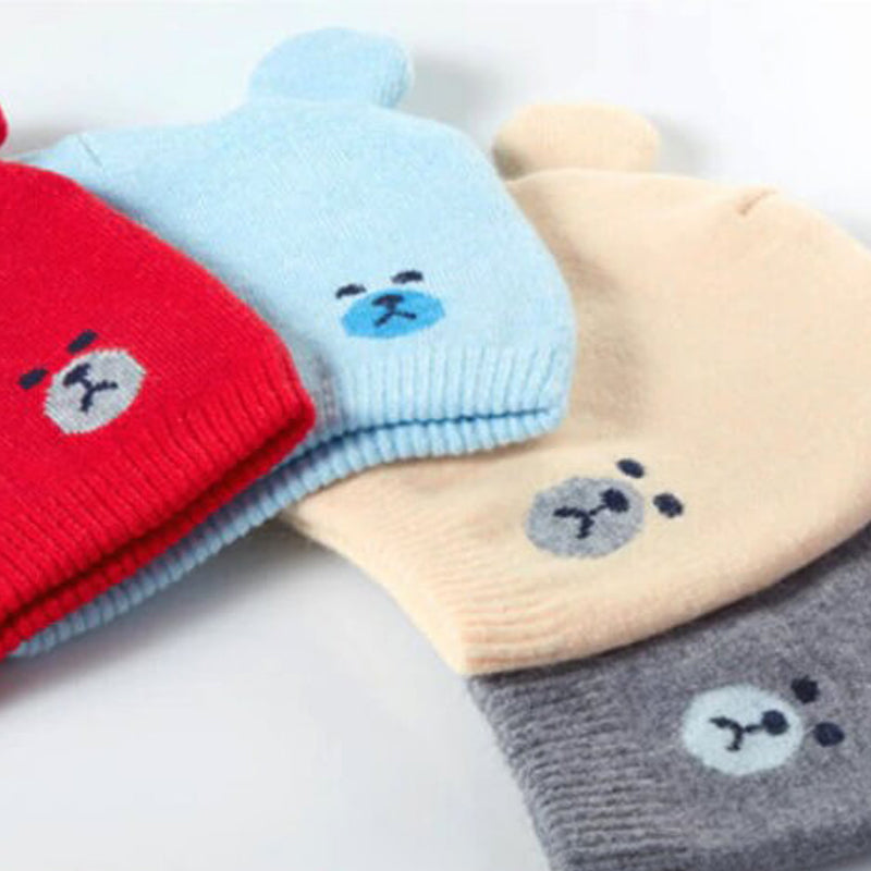 Set babymutsjes en sjaals