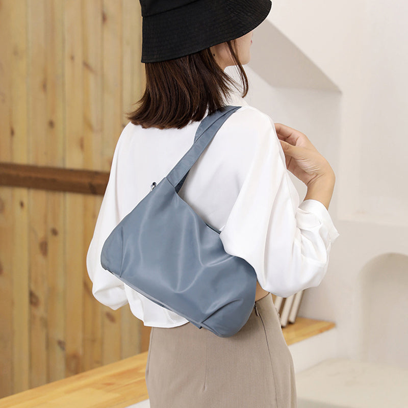Schouder- en crossbody-lichte en veelzijdige vrijetijdstas