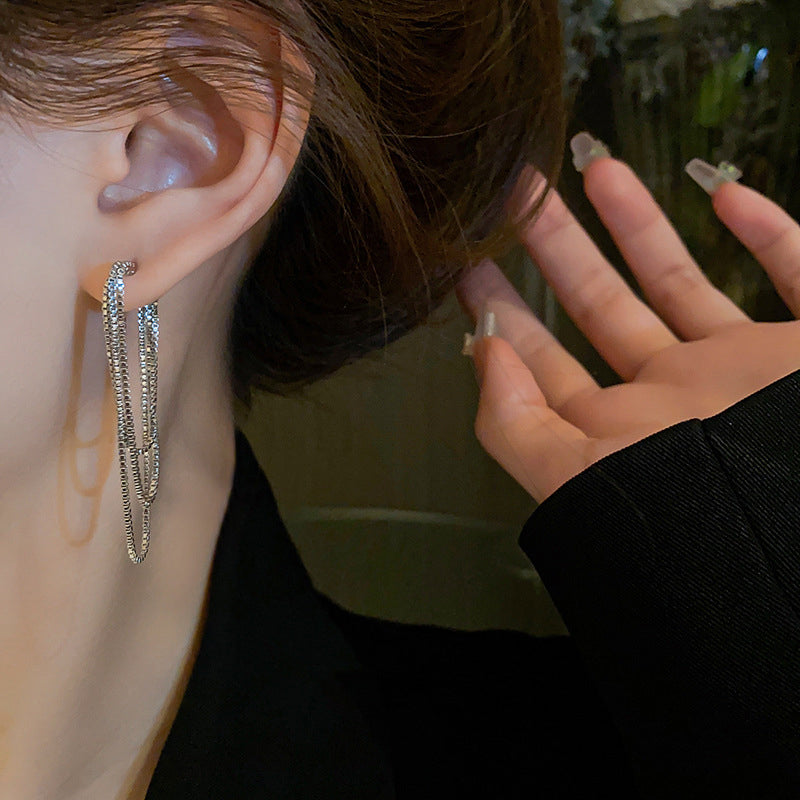 Zachte zilveren ketting kwast oorbellen