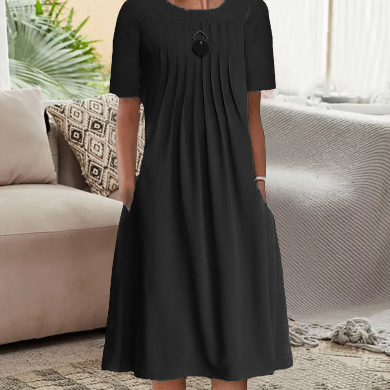 Effen geplooide jurk met ronde hals