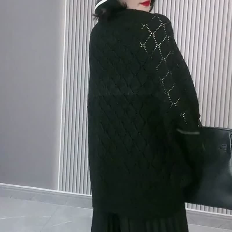 Uitgeholde gebreide sjaal