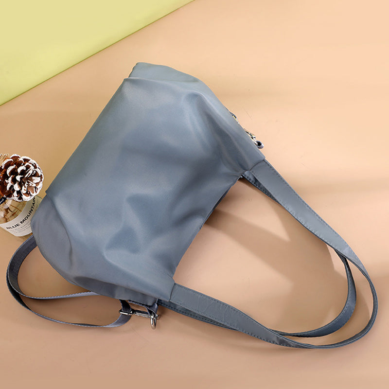 Schouder- en crossbody-lichte en veelzijdige vrijetijdstas