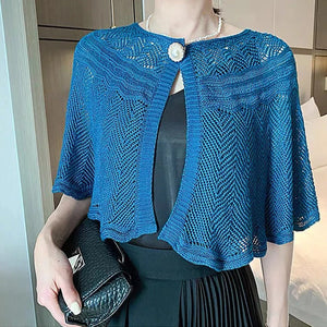 Holle sjaal met parel knoop