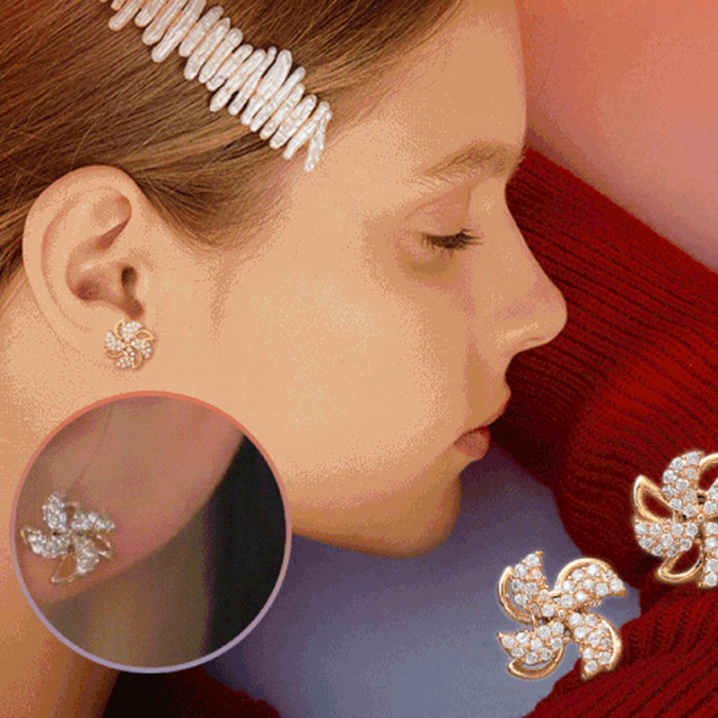 Draaiende molen oorbellen