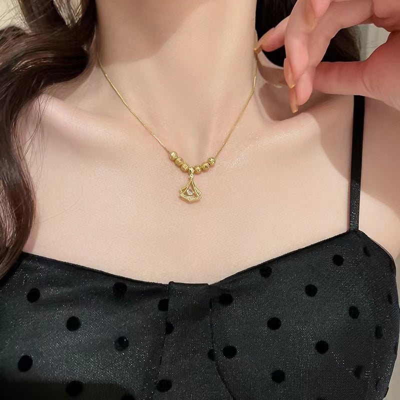 Slimme ginkgo blad ketting