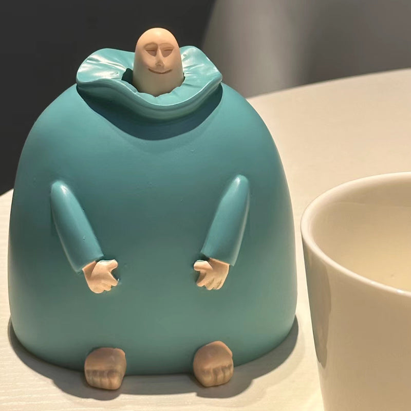 Kleine blauwe middelvingerornament