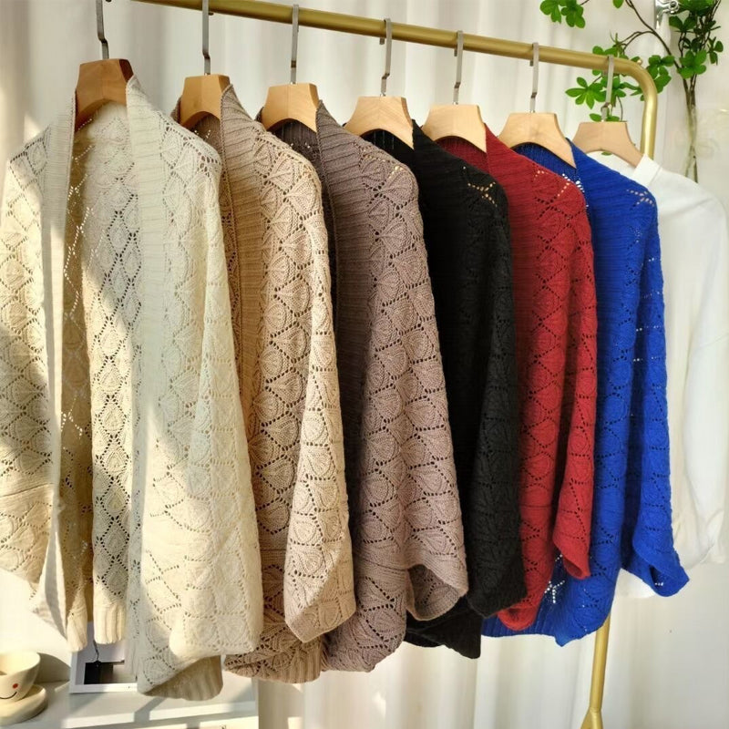 Uitgeholde gebreide sjaal