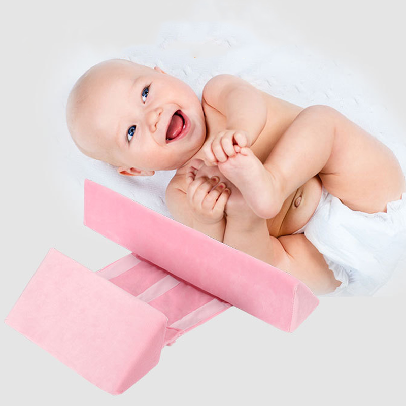 Slaapkussen aan babyzijde