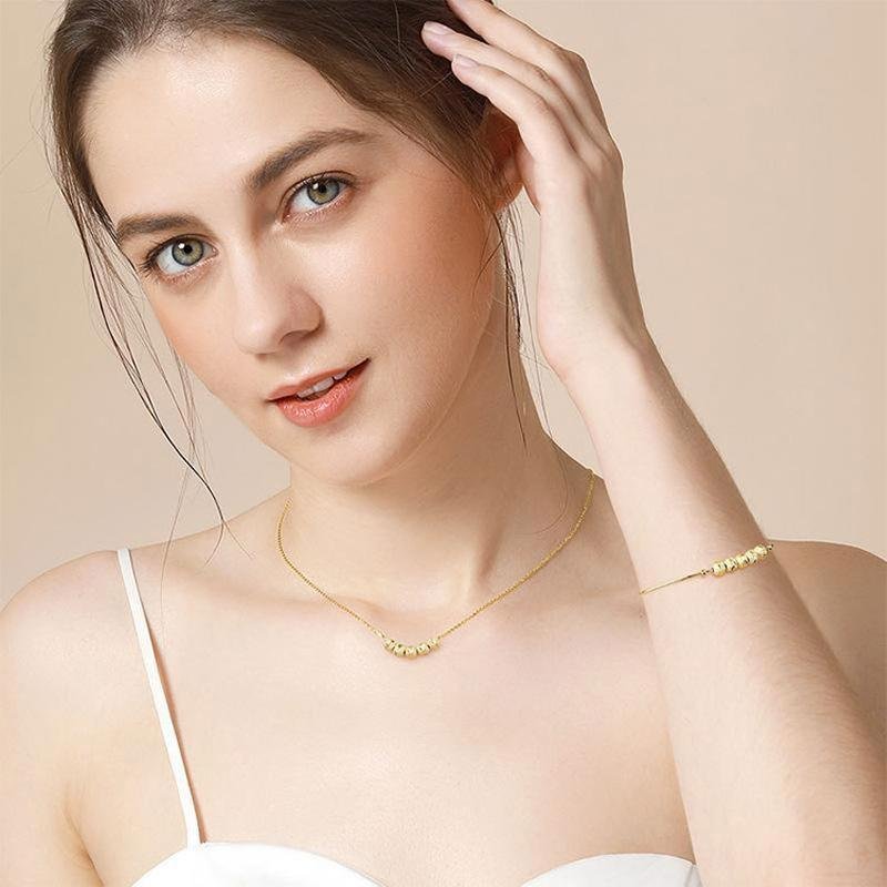 Overdracht kralen ketting en armband