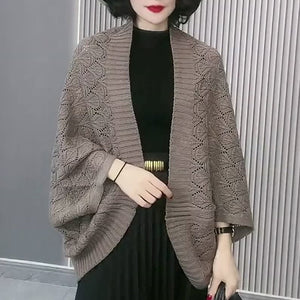 Uitgeholde gebreide sjaal