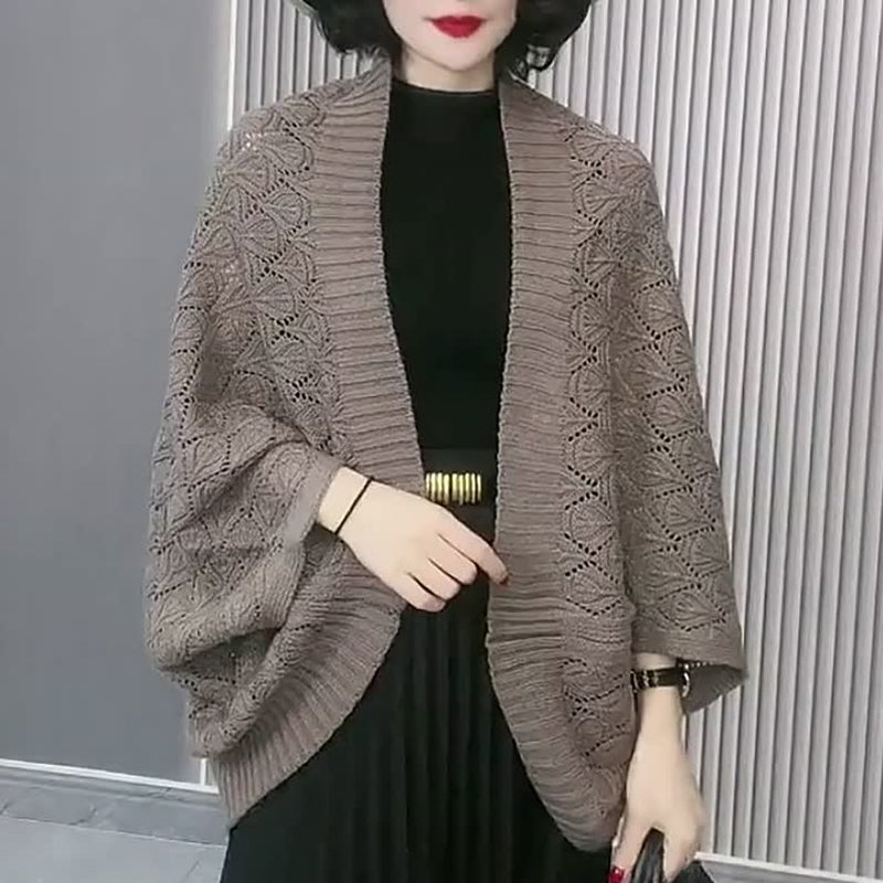 Uitgeholde gebreide sjaal