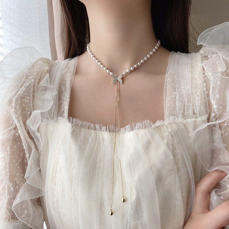 Verstelbare ketting met vlinderparel