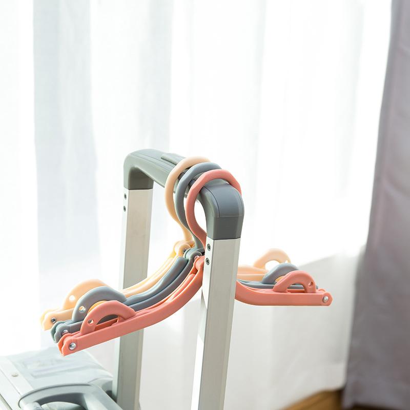 Intrekbare draagbare reis hanger