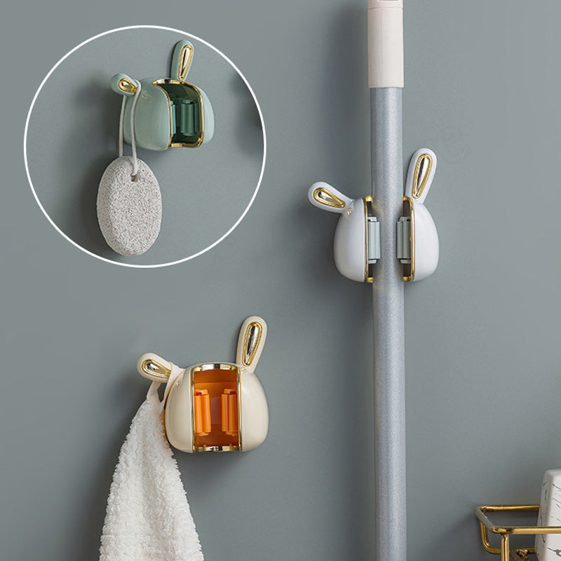 Schattige konijnenmophouder