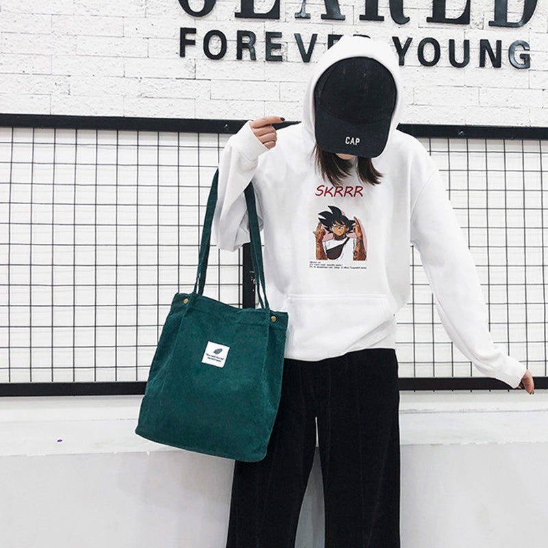 Corduroy draagtas met letterpatch