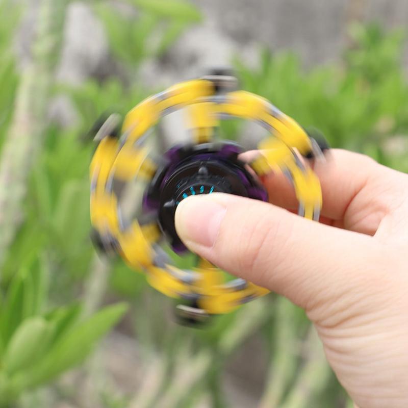 Fidget spinner with suction cup