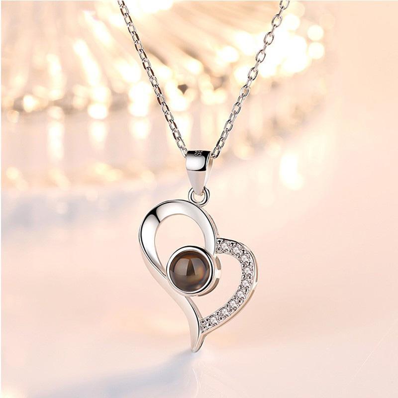 Hartketting met liefdesprojectie (I Love You in 100 talen)