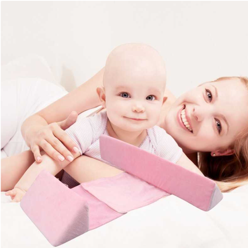 Slaapkussen aan babyzijde