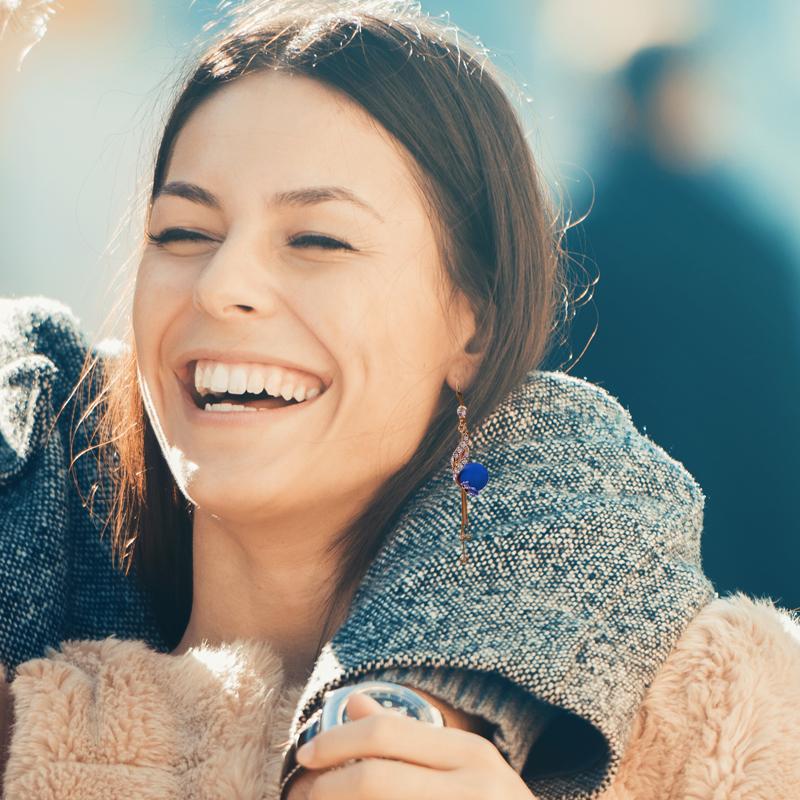 Elegante pauwenoorbellen (2 kleuren)