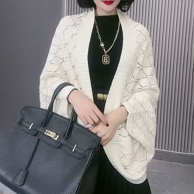 Uitgeholde gebreide sjaal