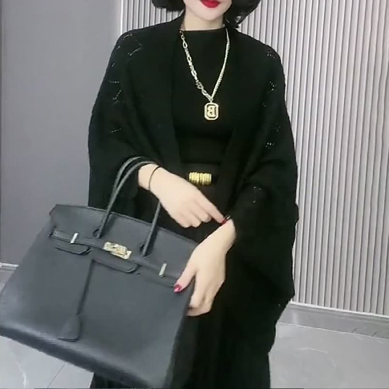 Uitgeholde gebreide sjaal