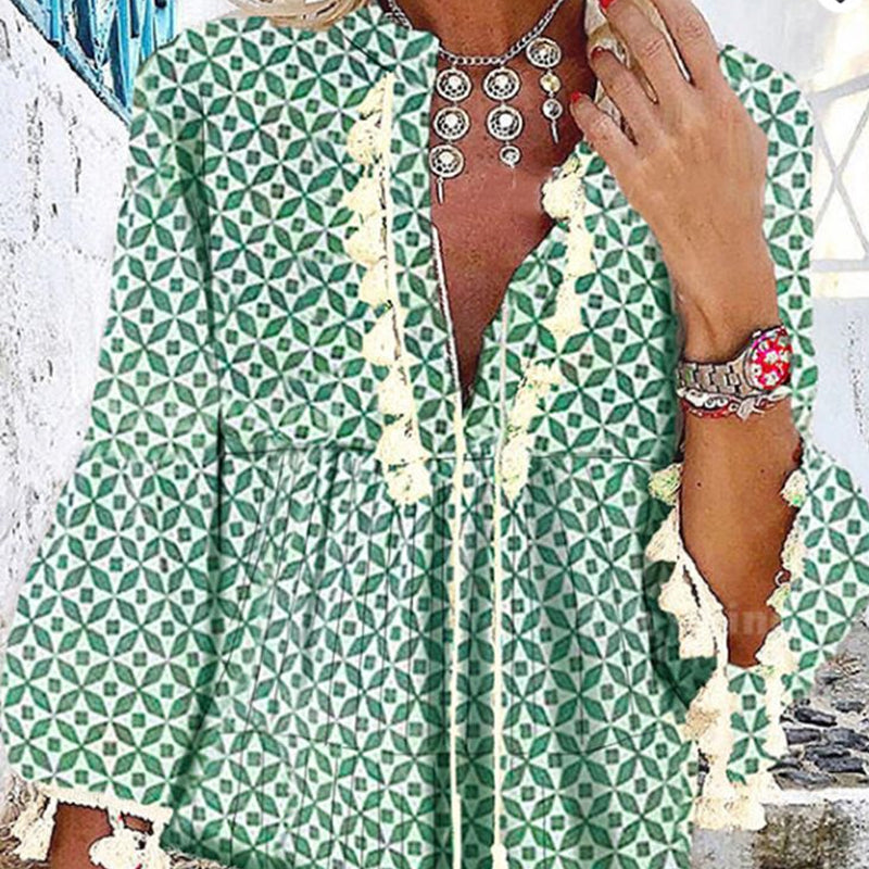 Producten Jurk met V-hals en franjes met ruches