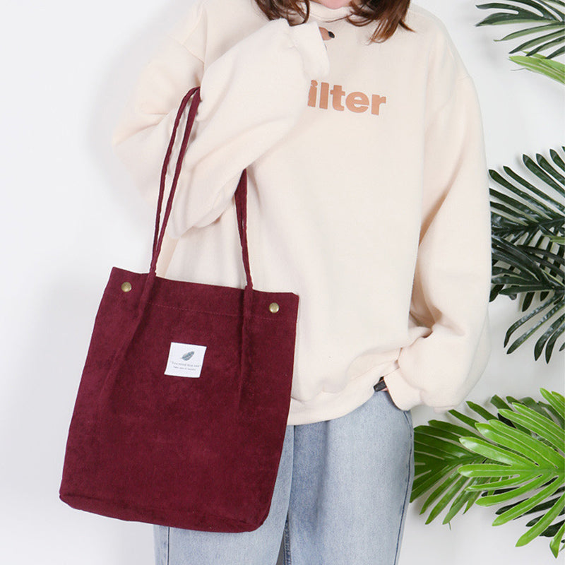 Corduroy draagtas met letterpatch