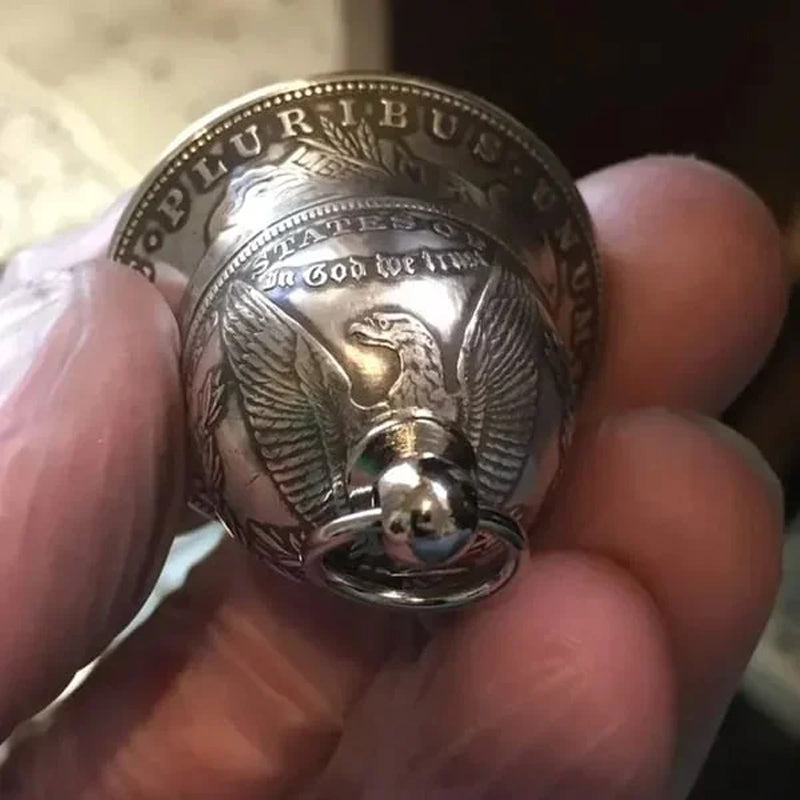 Morgan zilveren dollar bel