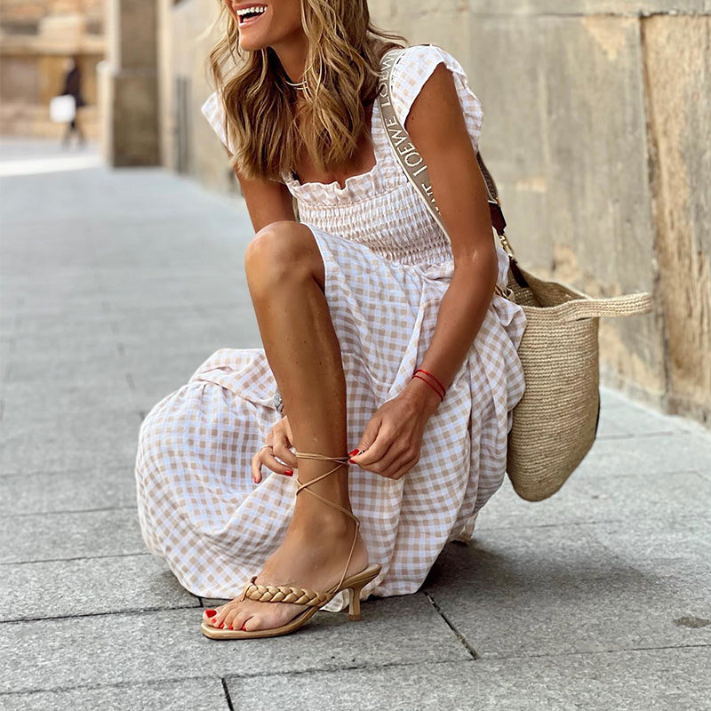 Geruite gesmokte buste maxi-jurk