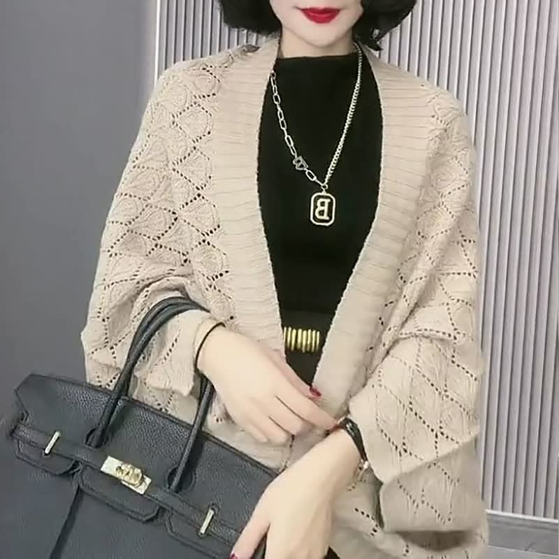 Uitgeholde gebreide sjaal