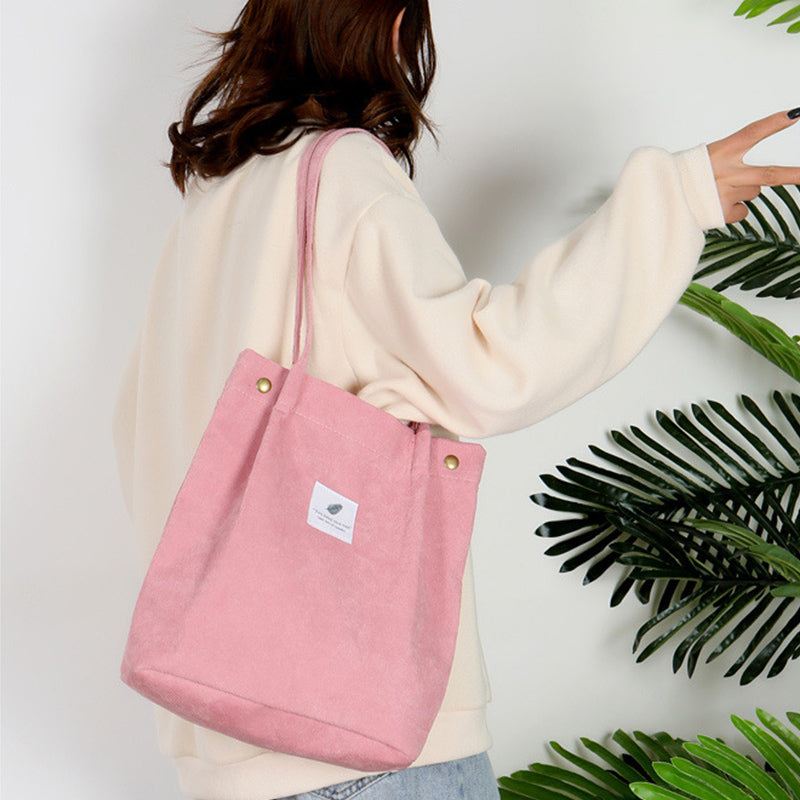 Corduroy draagtas met letterpatch