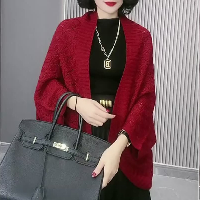 Uitgeholde gebreide sjaal