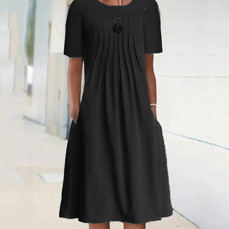 Effen geplooide jurk met ronde hals