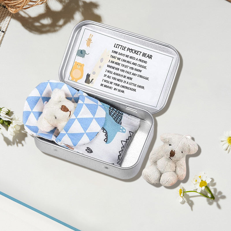 Teddybeer in een blikken doos