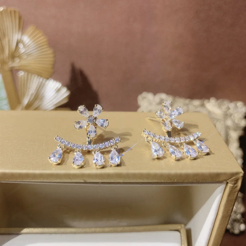 Oorknopjes met bloem zirkoon kwastje