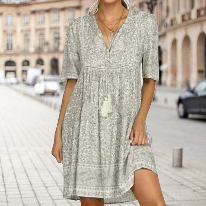 Losvallende jurk met V-hals en print