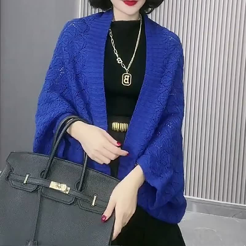 Uitgeholde gebreide sjaal