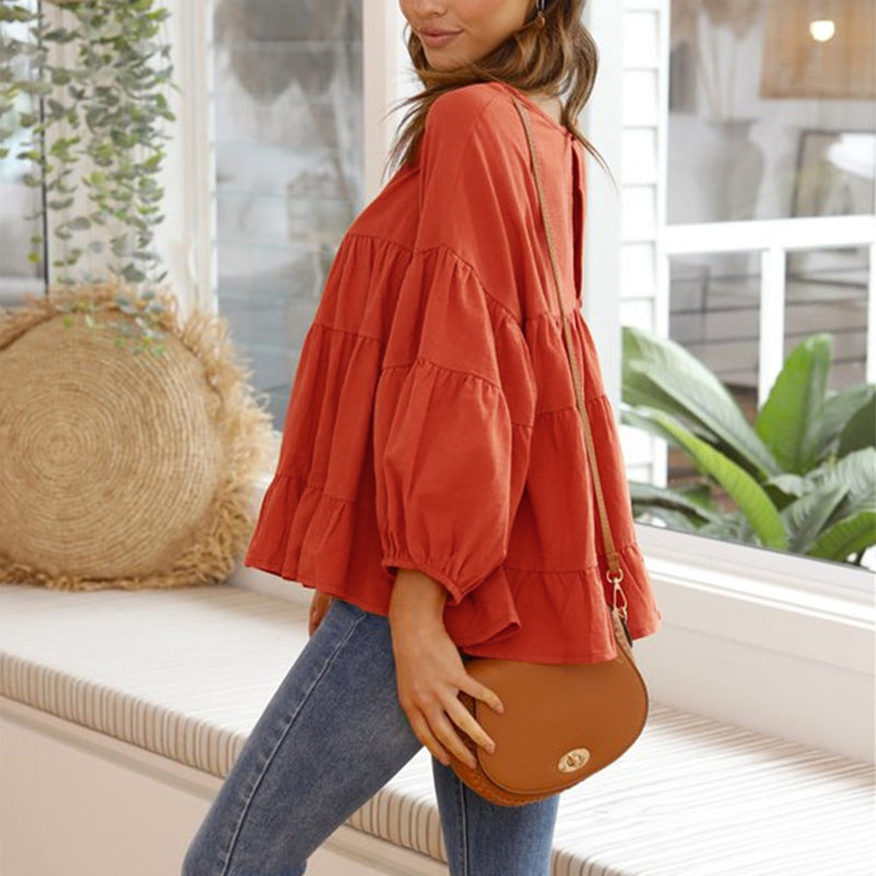 Top met ronde hals en lantaarn met lange mouwen